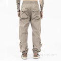 Pantalones multibolsillos sueltos de color sólido para hombres OEM al por mayor
